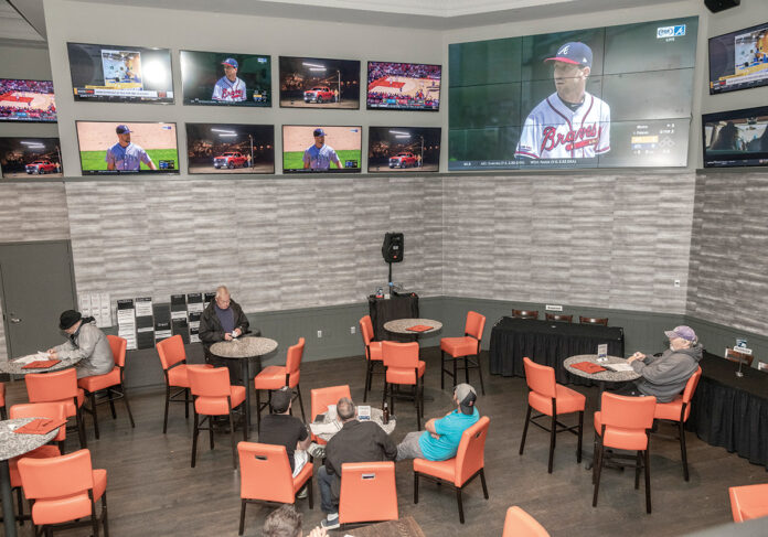 ROOM TO IMPROVE: Revenue from betting at the sportsbook at Twin River Casino Hotel in Lincoln, as well as at the Tiverton Casino Hotel and through a mobile app, has fallen short of Rhode Island’s projections since sports betting launched last year. / PBN FILE PHOTO/MICHAEL SALERNO ROOM TO IMPROVE: Revenue from betting at the sportsbook at Twin River Casino Hotel in Lincoln, as well as at the Tiverton Casino Hotel and through a mobile app, has fallen short of Rhode Island’s projections since sports betting launched last year. / PBN FILE PHOTO/MICHAEL SALERNO
