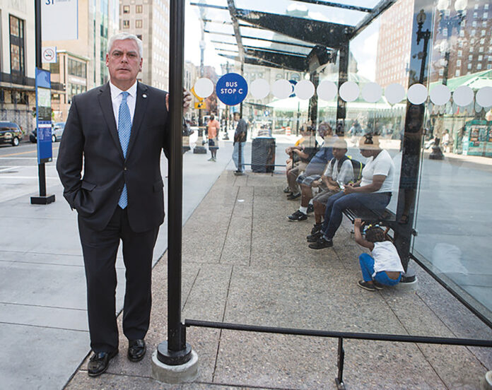 RIPTA CEO Scott Avedisian, at a stop at Kennedy Plaza in downtown Providence. He says feedback from riders on the state’s plan to create multiple bus hubs in downtown Providence has been mixed. / PBN FILE PHOTO/ RUPERT WHITELEY