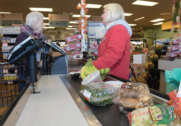 FRIENDLY FACE: Tom’s Market in Tiverton saw increased sales in the months after an April strike at Stop & Shop. Cashier Elizabeth Pence, right, speaks with a customer. / PBN FILE PHOTO/
MIKE SKORSKI FRIENDLY FACE: Tom’s Market in Tiverton saw increased sales in the months after an April strike at Stop & Shop. Cashier Elizabeth Pence, right, speaks with a customer. / PBN FILE PHOTO/
MIKE SKORSKI