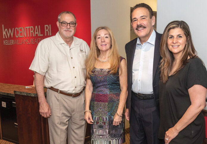 BALANCED GROWTH: From left, Carl Coutu, Jo Anne Samborsky, Joseph Dias and Jennifer Bove, franchise owners of Keller Williams Central Rhode Island in Cranston. Coutu, who purchased the location in 2011 and is stepping down as operating principal, will be succeeded by Bove. / PBN PHOTO/MICHAEL SALERNO BALANCED GROWTH: From left, Carl Coutu, Jo Anne Samborsky, Joseph Dias and Jennifer Bove, franchise owners of Keller Williams Central Rhode Island in Cranston. Coutu, who purchased the location in 2011 and is stepping down as operating principal, will be succeeded by Bove. / PBN PHOTO/MICHAEL SALERNO