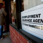 U.S. JOBLESS claims increased by 14,000 to 225,000 last week . /BLOOMBERG NEWS FILE PHOTO/JEFF KOWALSKY