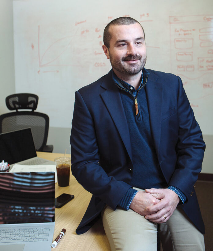 Dan Gertrudes founded GrowthLab five years ago with Steven Byler, now president, managing partner and chief operating officer. The Providence-based company works with startups on growth plans and this year hired several new staffers. / PBN PHOTO/RUPERT WHITELEY