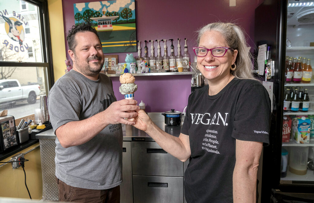 VEGAN VENTURE: Chris Belanger, left, and Karen Krinsky are the owners of Like No Udder, a vegan ice cream shop in Providence. The venture began as a vegan ice cream food truck before expanding to add the shop. / PBN PHOTO/MICHAEL SALERNO