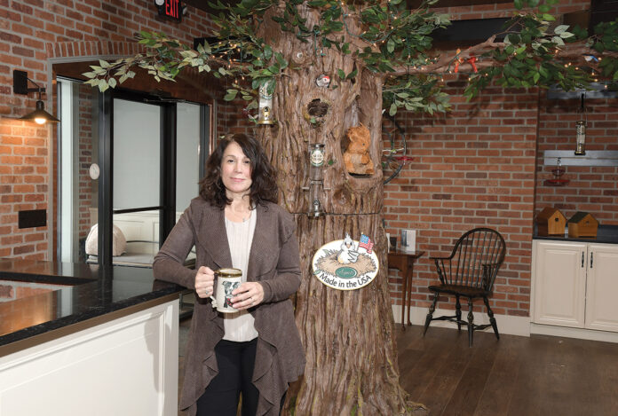 REAL RHODY DEAL: Trisha Torres, co-owner of bird feeder manufacturer Aspects Inc. in Warren, takes pride in the fact the company has exclusively been making lawn and garden products at its Rhode Island facility for 40 years. / PBN PHOTO/MIKE SKORSKI