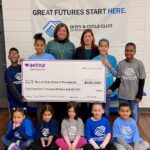 $500,000 grant from the Aetna Foundation to Nicole Dufresne, CEO of the Boys & Girls Clubs of Providence. The grants will support efforts to prevent youths from misusing tobacco drugs and alcohol and from engaging in premature sexual activity. / COURTESY AETNA FOUNDATION