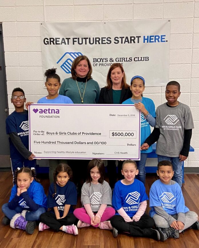 $500,000 grant from the Aetna Foundation to Nicole Dufresne, CEO of the Boys & Girls Clubs of Providence. The grants will support efforts to prevent youths from misusing tobacco drugs and alcohol and from engaging in premature sexual activity. / COURTESY AETNA FOUNDATION