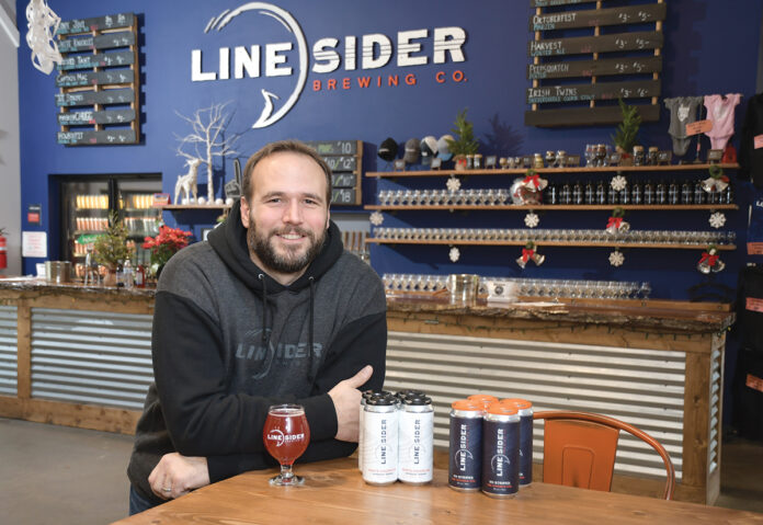 DRAFT PICK: Jeremy Ruff, co-owner and head brewer at LineSider Brewing Co. in East Greenwich, says the Rhode Island Brew Fest, which LineSider participated in last year and will be again this month, exposes the brewery to new customers. / PBN PHOTO/MIKE SKORSKI