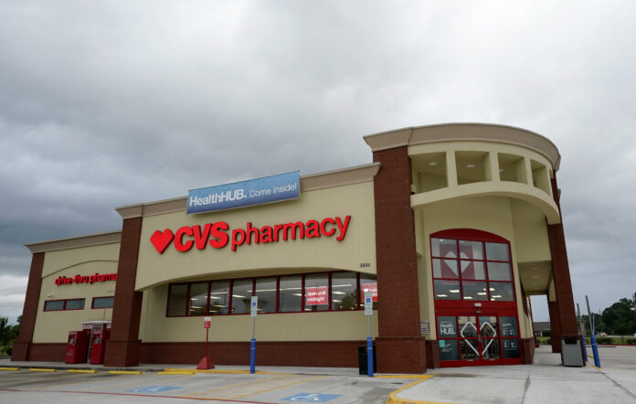 A COALITION OF PHARMACIES, including CVS, have argued in federal court that doctors and other health care practitioners who write prescriptions bear ultimate responsibility for improper distribution of opioids to patients, not pharmacists. / AP FILE PHOTO/DAVID J. PHILLIP